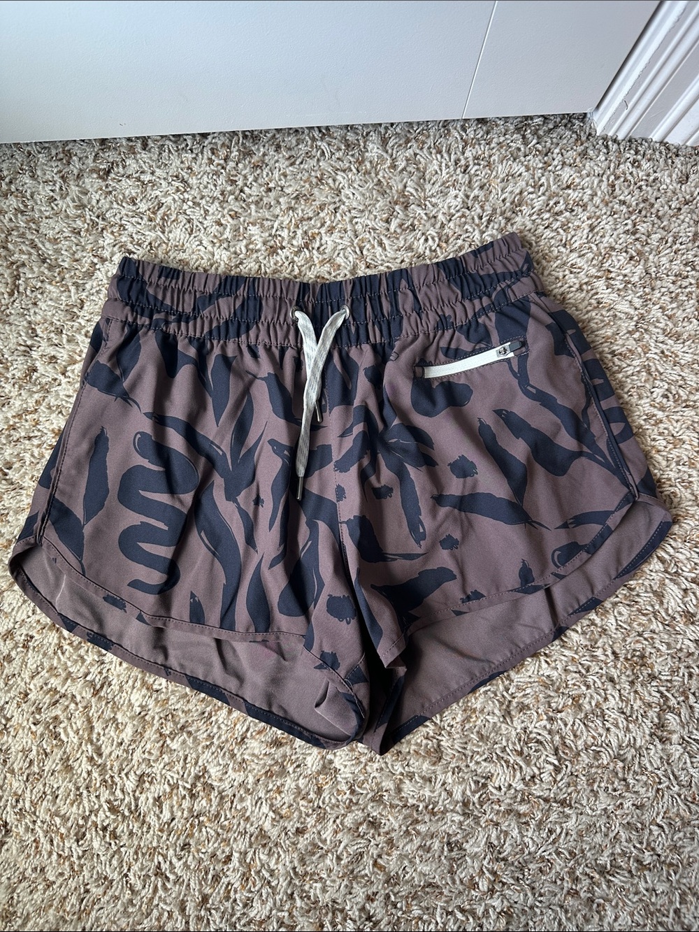 Vuori Women's Athletic Shorts in Brown with Black Print